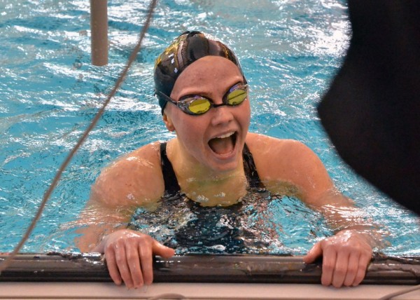 Katie Hughes shows her joy after winning the 500 free Saturday afternoon. 