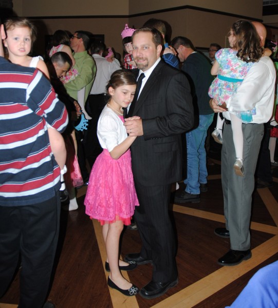 McKenzie, then nine, left, and Joe Long dance the night away at the 2014 Lakeland Youth Center Daddy-Daughter Dance. The 2015 “Masquerade Ball” will be held Saturday, March 21. Ticket deadline is March 5. (Photo by Martha Stoelting)