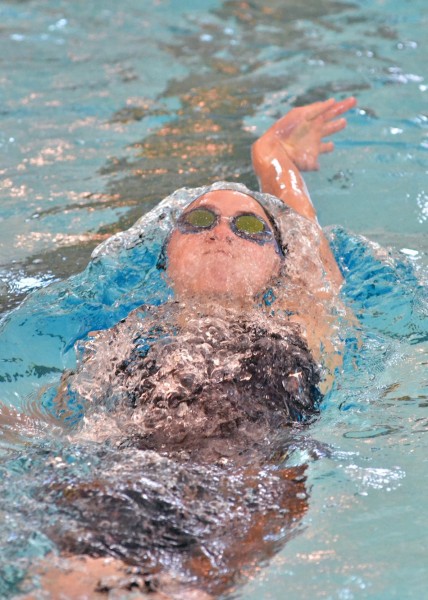 Paige Miller swims the 200 IM during the sectional. Miller will look to break the school record at state. (Photo by Nick Goralczyk)