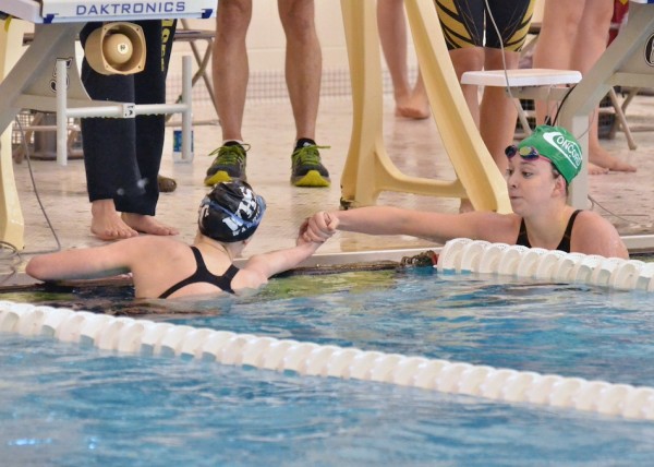 Concord's Ashley Schrock (right) congratulates Wawasee's Paige Miller after Miller edged Schrock out for the 200 IM title. 