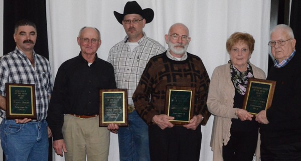 The annual Kosciusko County SWCD meeting and banquet recognizes achievements and leadership of individuals. Shown are those recipients. From left are Brent Wood accepting the Forestry Award on behalf of Juanita Beeler; Rod Metzger and Gary Spangle, Metzger Cattle Company, Conservation Farmer of the Year; Glenn Pfleiderer, Environmental Enhancement Award; and Peggy and Garwin Eaton, Eaton Grain Farms LLC, recipients of the River Friendly Farmer award. (Photo by Deb Patterson)
