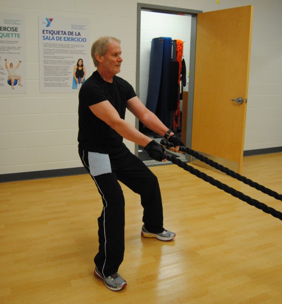 The new Parkview Warsaw YMCA offers plenty of amenities, such as group fitness classes and a variety of exercise equipment. Pictured is Larry Dixon, a YMCA member, doing battle ropes.