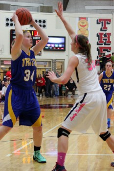 Lauren Hostrawser of Triton scans for a teammate against South Central.