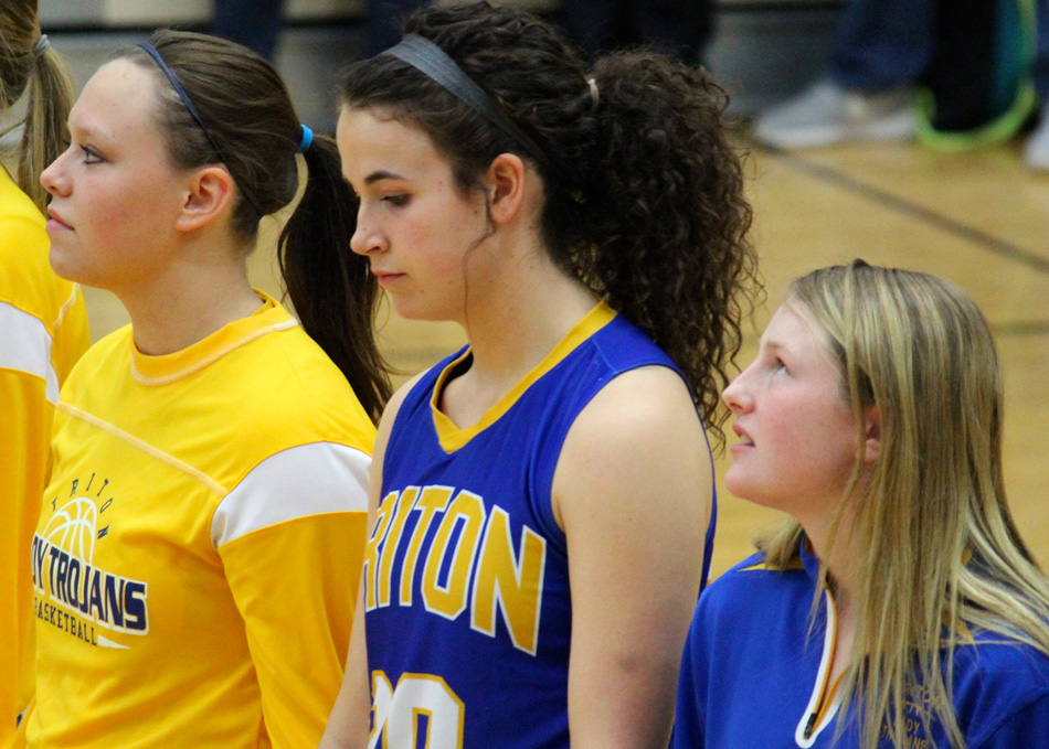 Triton players (from left) Shayla May, Becca Kennedy and Krystal Sellers stand during pregame ahead of the sectional matchup with South Central Friday night. (Photos provided by Jennifer Mosier)
