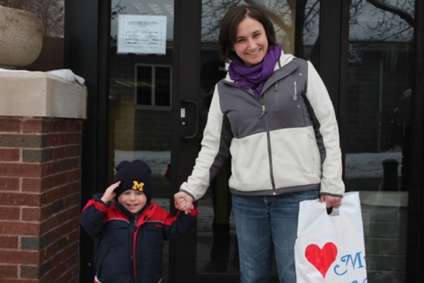 Riker Larson and his mom Becky Larson exit through the new door on Harrison Street. The side entrance to the children’s department had been closed while work was completed on the steps and in the bathrooms. The doors on the front entrance were also replaced and are lighter and easier to open.