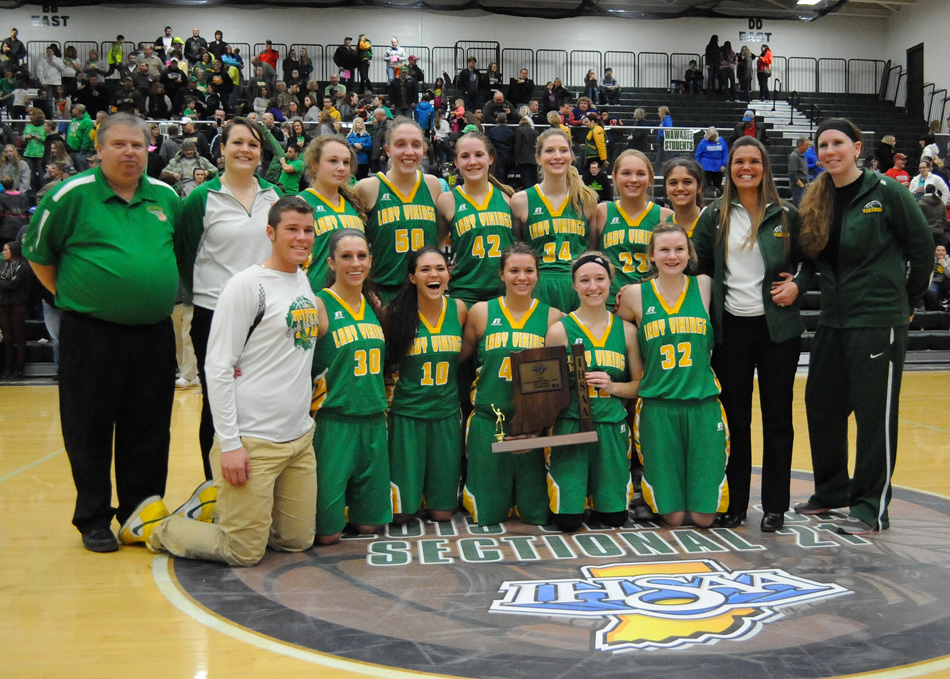 Tippecanoe Valley poses with the sectional trophy after beating Whitko, 62-36 Monday night in the Wawasee Girls Basketball Sectional championship game. (Photos by Mike Deak)