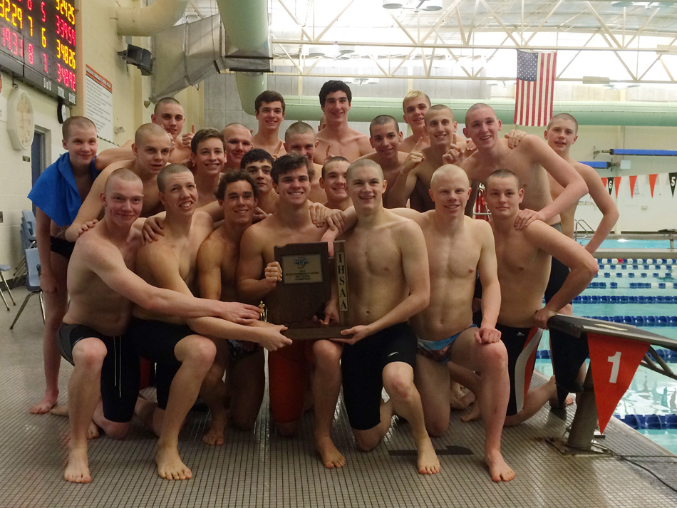 The Warsaw boys swim team pose with the sectional trophy after taking the Warsaw Boys Swim Sectional Saturday afternoon, it's eighth straight sectional team championship. (Photos by Mike Deak)