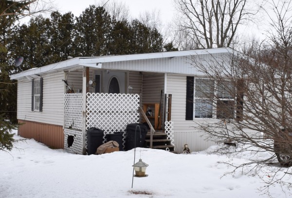 The home where an infant was allegedly battered by his/her mother. The child is now in foster care.