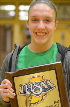 Sophomore Anne Secrest is all smiles with the state hardware.