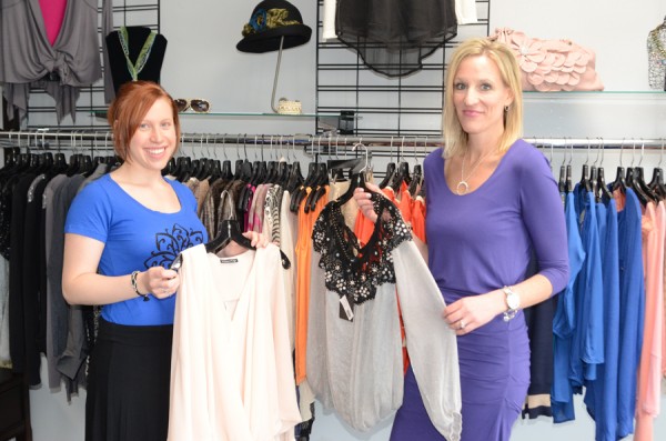 Sara Cousins, left, and Nicole Kelly, with Satouri Boutique, look at a few fashions they may bring to “The Life, The Love & The Passion of Fashion 2015” red carpet evening Saturday, April 25, at Oakwood Resort, Syracuse. Net funds raised will go to The Cancer Care Fund of Kosciusko County. (Photo by Deb Patterson)