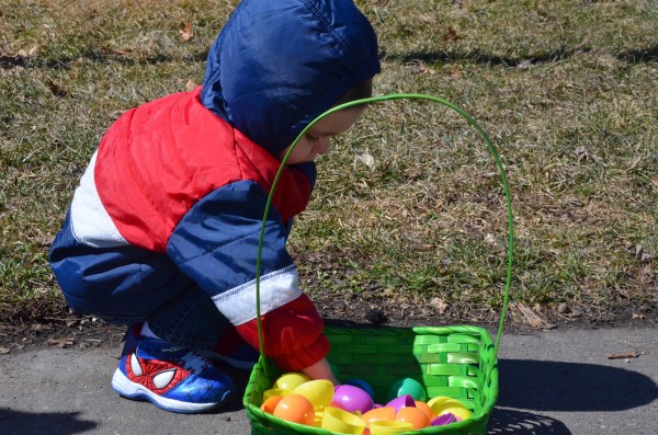 Kooper Jacbos counts his eggs after the 2-year old and under egg hunt.