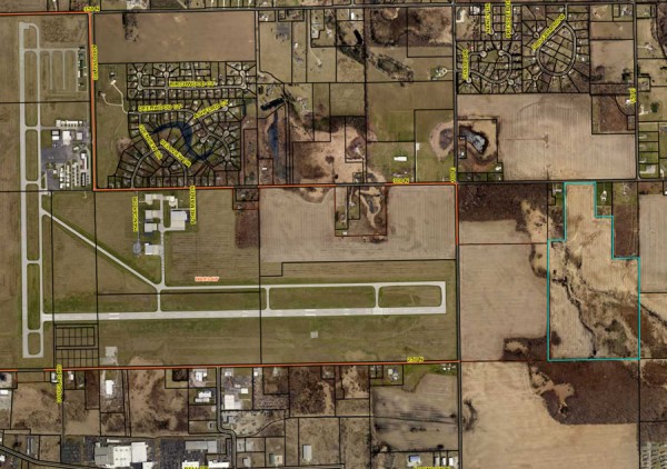 The area outlined in blue is the proposed property being purchased by the Warsaw Municipal Airport.