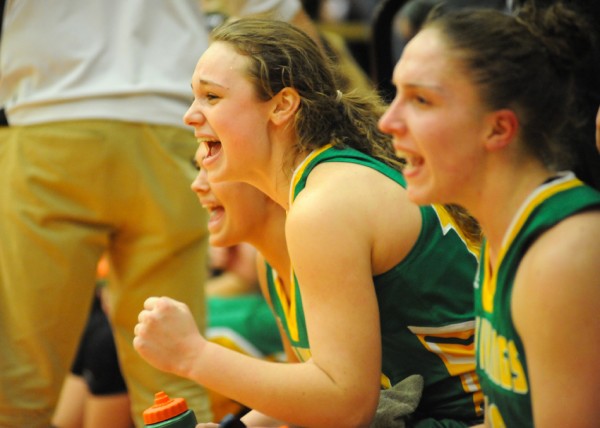 Meredith Brouyette cheers on her team during the semi-state contest against Rochester.