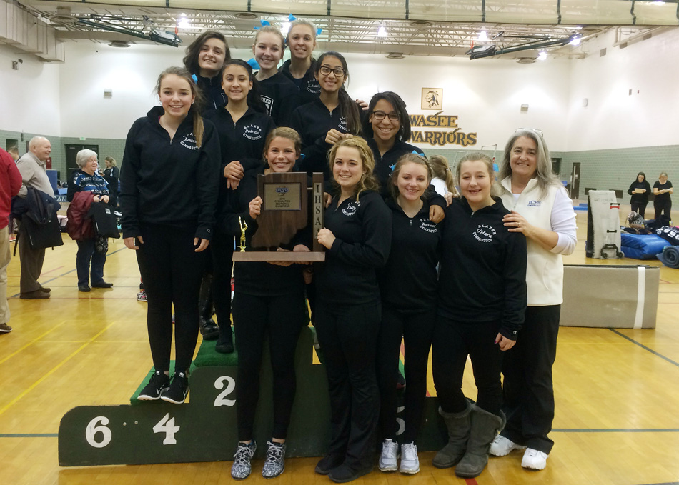 The Elkhart Central gymnastics team claimed the Wawasee Gymnastics Sectional trophy as the top team Saturday, its fourth title in program history. (Photos by Mike Deak)