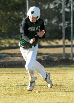 Wawasee's Kurtis Liston dances to avoid a ground ball down the third base line.