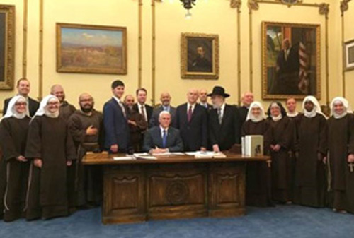 Pence signed the bill during a private ceremony Thursday. (Image Courtesy of Gov. Mike Pence's Twitter Account)