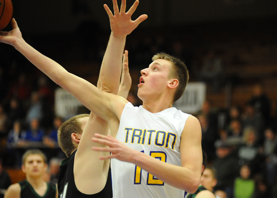 Masen Yeo of Triton attacks the basket Wednesday night against LaCrosse.