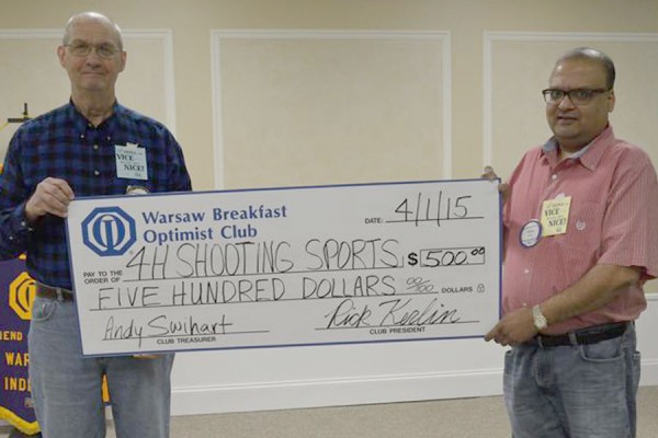 Pictured in the photo from left to right are Larry Bishop representing 4H Shooting Sports and Akash Jain representing the Warsaw Breakfast Optimist club. (Photo provided)