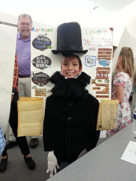 A Lincoln  Student portraying portrays the school's namesake.  (Photo by Alyssa Richardson)