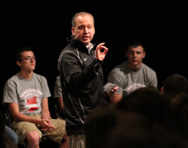 Chad Briscoe, Director of Athletics at Grace College, speaks during the Sportsmanship Summit today.