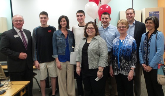 Warsaw Community High School Senior Jacob Mangas was named a 2015 Kosciusko County Lilly Endowment Community Scholar. Pictured (left to right): WCHS Principal, Troy Akers; Jacob’s younger brother; Jacob’s mother, Ann; Jacob; Kosciusko County Community Foundation Executive Director, Suzie Light; Jacob’s father, Tim Mangas; KCCF Board Member, Sharon Sommers; Warsaw Schools Superintendent, David Hoffert; and Warsaw Schools Board Member, Jennifer Tandy. (Photo provided)