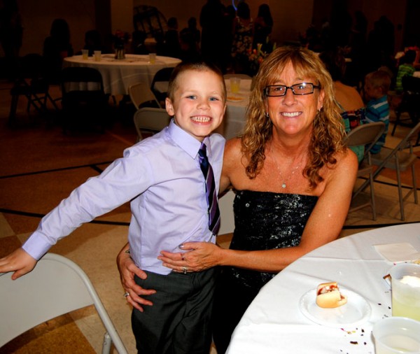 Wendy Evans enjoys the Mommy Son Dance with her grandson, Brody Young, 6, at tonight's  Mommy Son Dance at the Syracuse Community Center. (Photos by Phoebe Muthart)