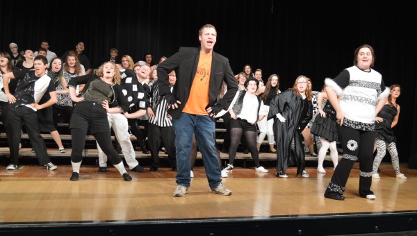 William Bennett, left, and Jade Grady are out front leading the Wawasee High School Choral Department in preparation for the 2015 Pops Show, “Forever Polyester.”