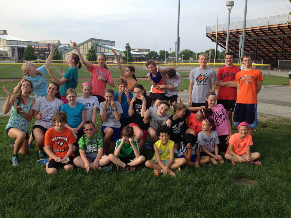 Members of the 2014 Blue Ribbon Distance camp goof around during a group photo. (Photo provided)