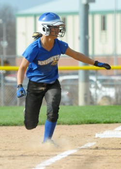 East Noble's Brianna Glass heads home for one of her four runs scored Tuesday against Warsaw.