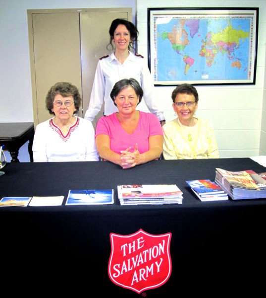 Planning Committee pictured from left: Ruth Casner, Ann Pinnick and Sharodene Norris with Lt. Karen Pommier standing. 