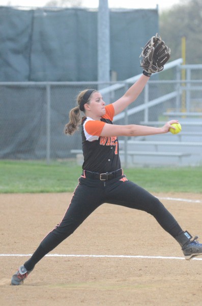 Warsaw pitcher Abby Glass winds up Monday night at Elkhart Memorial.