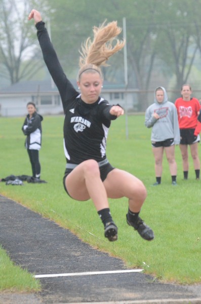 Samantha Alexander soared to a new school record in winning the long jump for Warsaw Tuesday night at Concord.