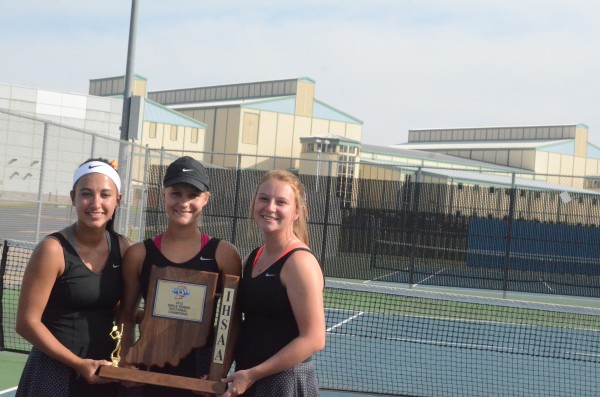 Seniors Sydney Hartman, Camille Kerlin and Shelby Roberts proudly display the sectional championship trophy.