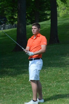 Jonny Hollar chips on to the green.