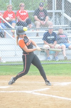 Taylor Stiver fouls off a pitch for Warsaw.