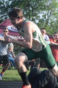 Clayton Cook blasts out of the starting blocks in the trials of the 200 Thursday night.