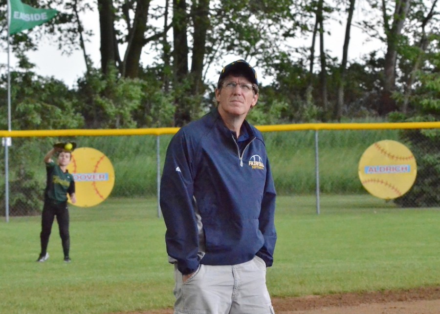 Fairfield head coach John Skibbe checks out the sky during the first inning of his team's game with Wawasee. Play was suspended until Wednesday evening. (Photo by Nick Goralczyk)