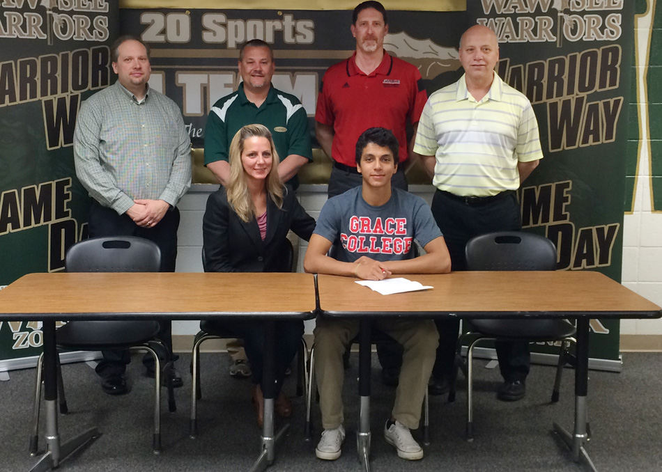Wawasee senior Jacob 'JJ' Gilmer has signed a letter of intent to continue his track and field career at Grace College. Seated with Jacob is mother Rachel Gilmer. In the back row are Wawasee High School principal Mike Schmidt, Wawasee High School track and field coach Scott Lancaster, Grace College track and field coach Jeff Raymond and Wawasee High School athletic director Steve Wiktorowski. (Photo by Mike Deak)