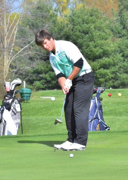 Maclain Herr watches as his ball falls just shot of being a birdie.