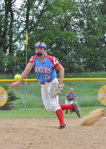 Paige Gust kicks up some dust as she tosses in this pitch for Lakeland.