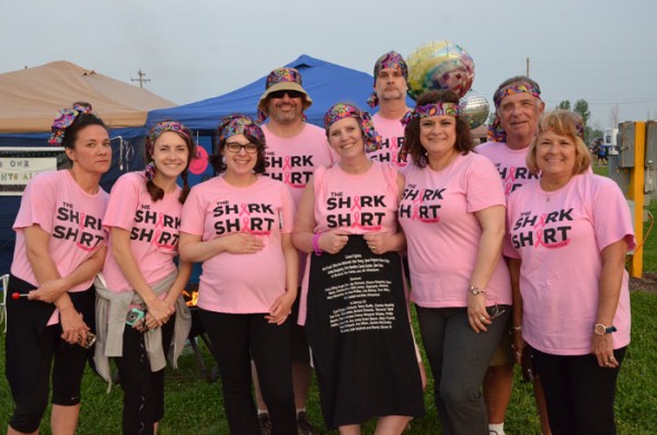 Lori Mawly, Casey Shirk, Westley Raver, Kelly McCammack, Jayson McCammack, Angie Shirk, Stan Pequignot, Sherry Pequignot and Dave VanDyke show support for those fighting cancer and for those who have lost their fight.  