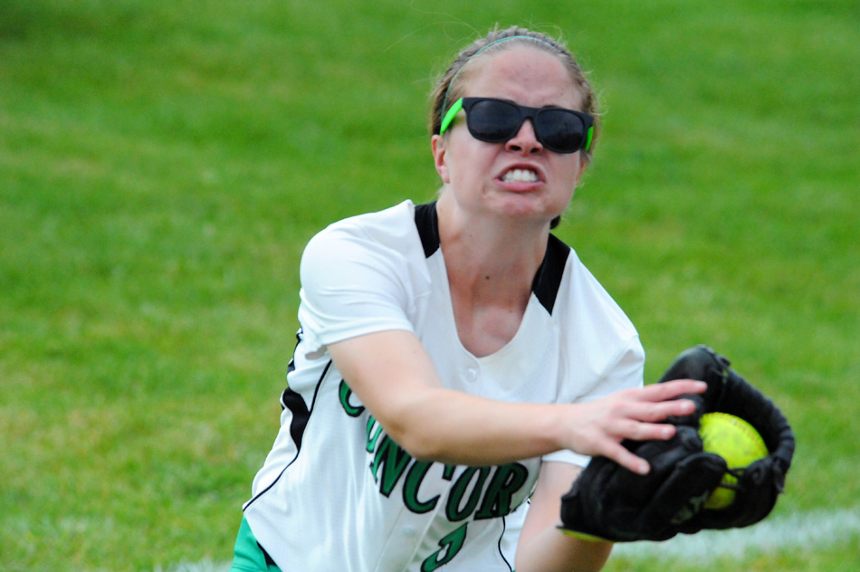 Concord right fielder Brittany Eichorst makes a running stab off the line drive of Wawasee's Danielle Gunkel.