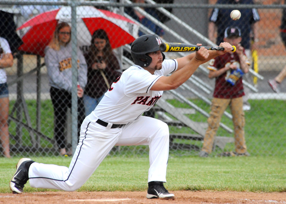 NorthWood's Dominic Miranda lays down a bunt attempt against Tippecanoe Valley in the semi-final game of the NorthWood Baseball Sectional. Miranda ended up with four RBIs as NorthWood pounded Tippecanoe Valley, 11-1, in five innings Saturday. (Photos by Mike Deak)