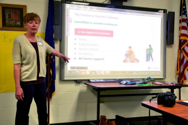 Kristi Harris, educator at Wawasee High School, presents slides with questions and solutions for parents, educators and students on how to improve educational resources.  (Photos by Chelsea Los)