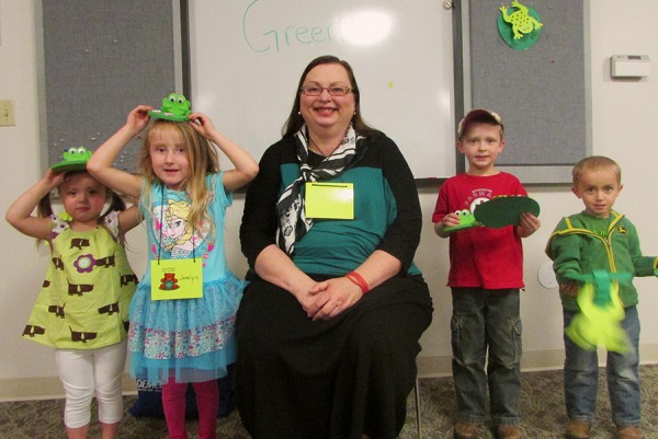 Kids had a great time listening to stories about the color green and making frog crafts at story time on April 28. They enjoyed a snack of green rice krispie squares and green punch. From left to right: Lylah Young, Jocelyn Keller, Julia Frew, Westen Haab, and Owen Morehouse.