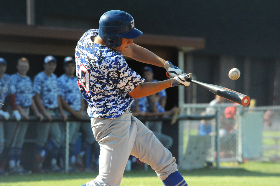 Whitko's Zach Snep makes solid contact with a pitch.