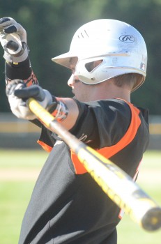 Tyler LaFollette warms up before hitting.