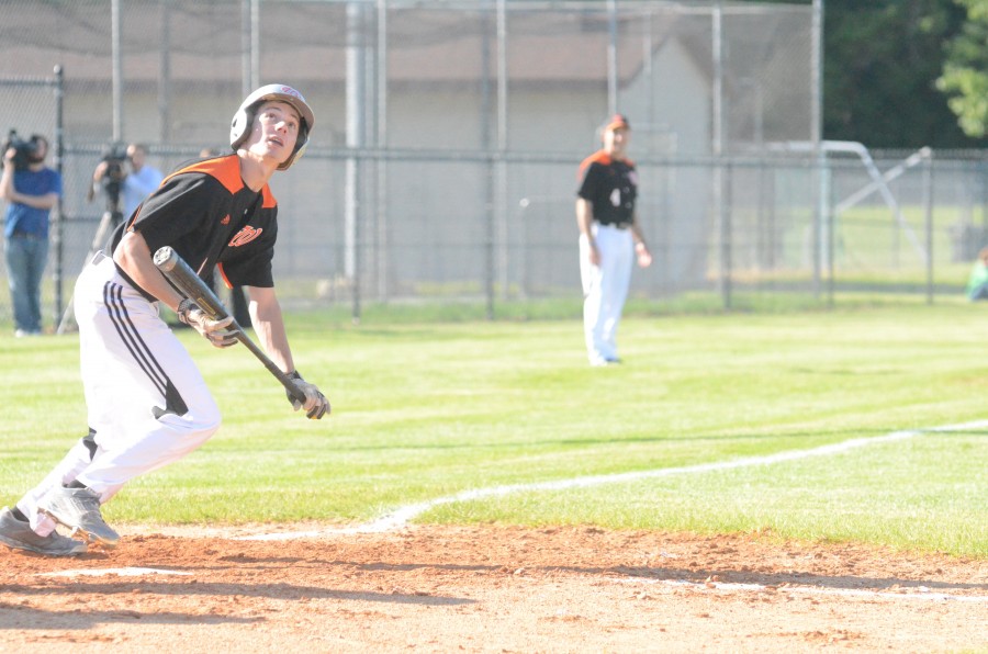 Brad Christenberry watches after fouling off a  bunt attempt for Warsaw.