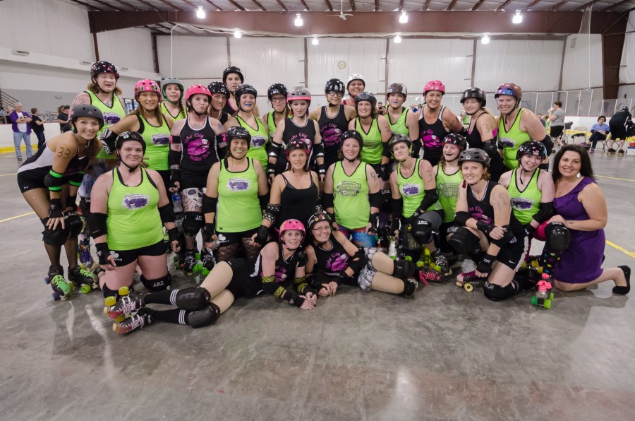 The Lake City Roller Dolls are shown with opponent Terrorz of Tiny Towns Saturday night. The Dolls defeated the Terrorz in a bout in Fishers (Photo provided by Andy Kerr)