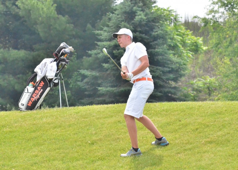 Michael Jensen chips onto the 14th green during Warsaw's 314 peformance at the Warsaw Regional. (Photos by Nick Goralczyk)